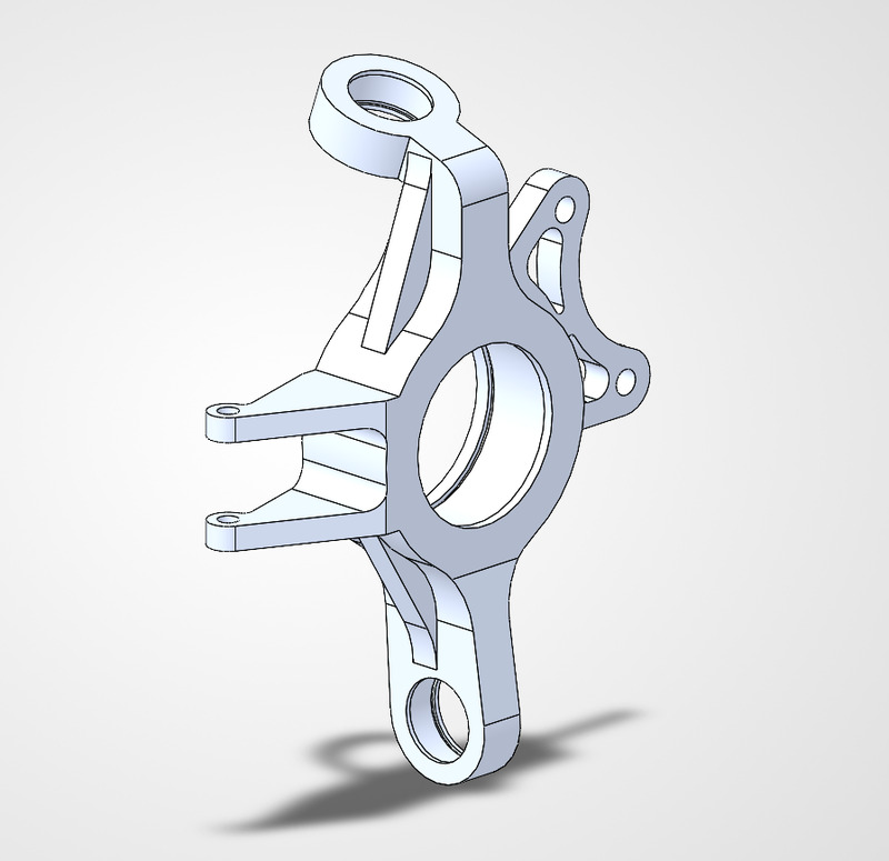 SolidWorks render of a machined front upright with bearing bore, A-arm mounting ears and steering arm