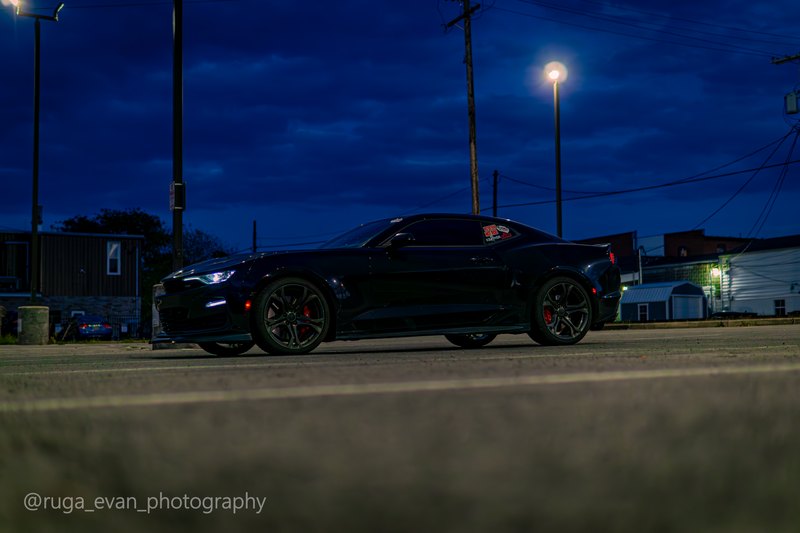 Black Camaro at dusk