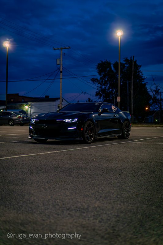 Black Camaro at dusk