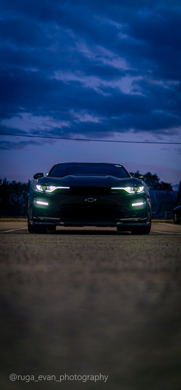 Black Camaro at dusk
