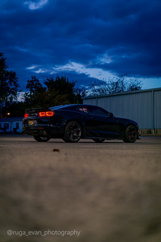 Black Camaro at dusk