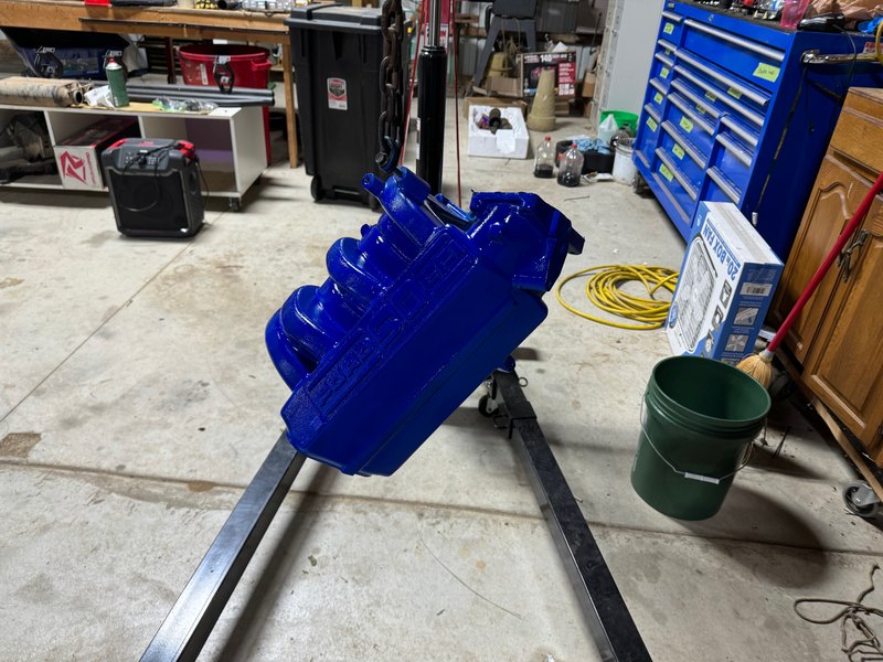 Engine part freshly painted blue, Jun 27, 2024