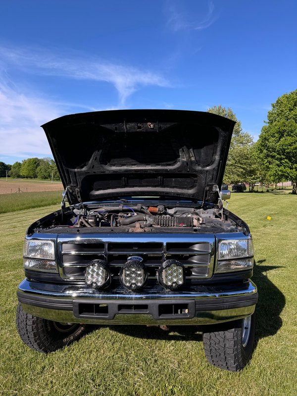 Hood up, front view, May 24, 2025