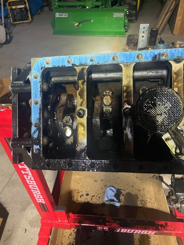 Block inverted on the stand: crankshaft and rods, Jun 27, 2023