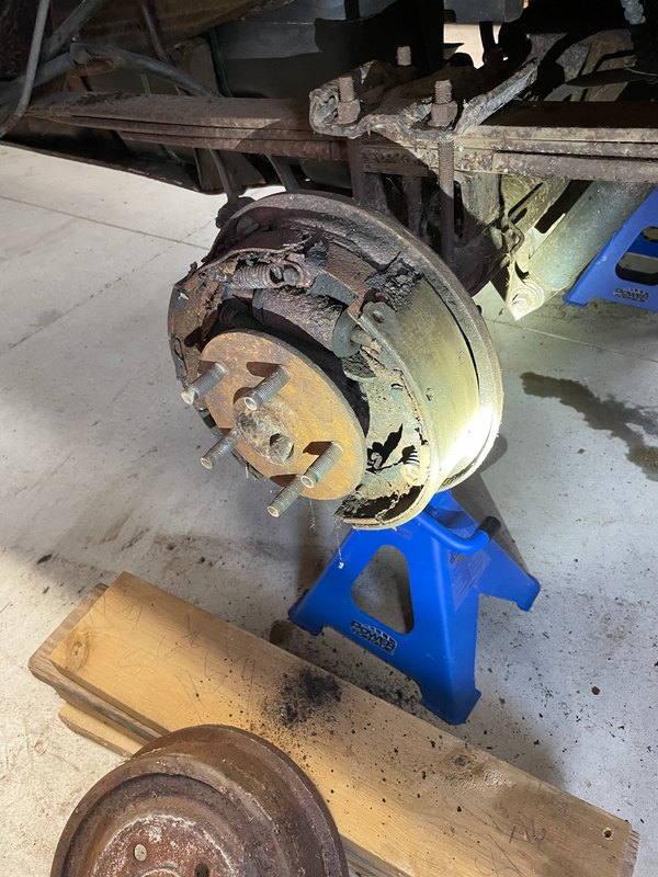 Drum brake taken apart, axle on a jack stand, Mar 28, 2022