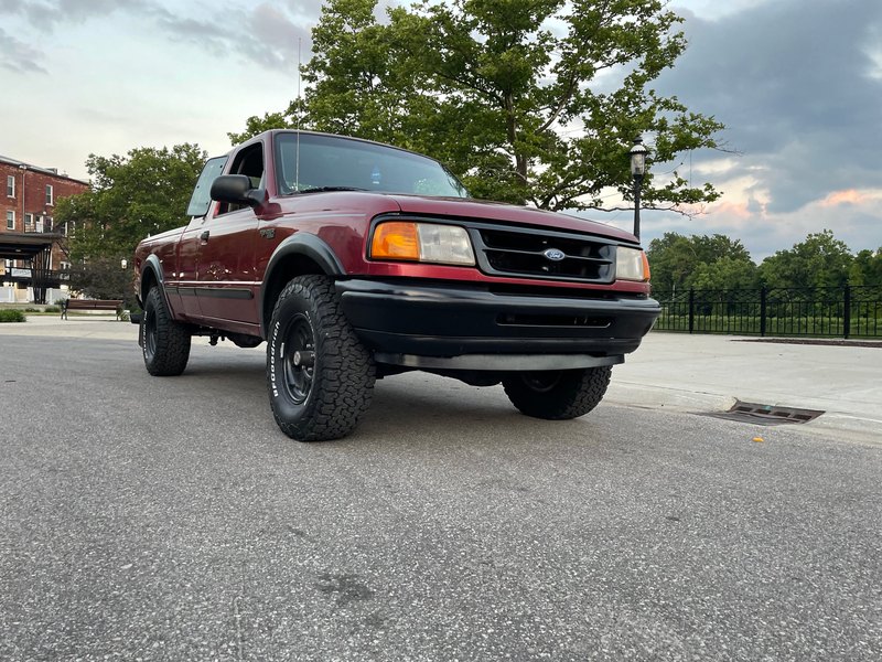 Front 3/4 view, black wheels, Jul 8, 2022